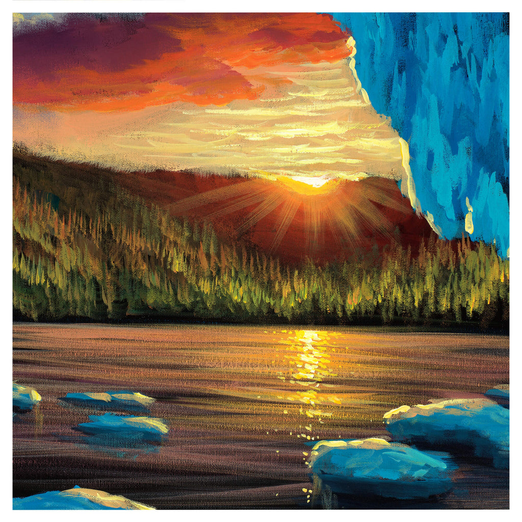 View of a colorful sunset through the entrance of an ice cave, overlooking a still lake surrounded by dense green forests and mountain peaks by Hawaii artist Walfrido Garcia.