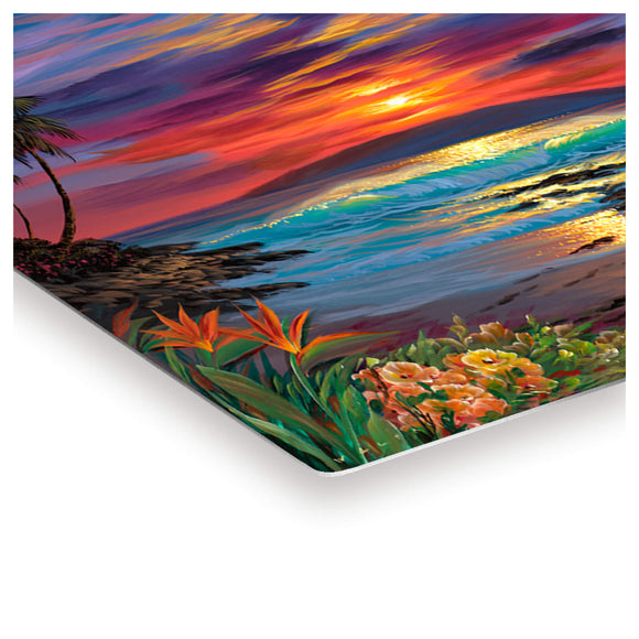 A metal art print featuring colorful tropical flowers framing a breath-taking Hawaii sunset by Hawaii artist Walfrido Garcia