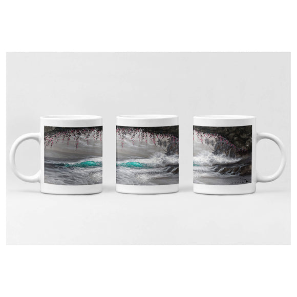 Ceramic mug featuring a wave seen in a cove with a unique color scheme that is primarily black and white by Hawaii artist Walfrido Garcia